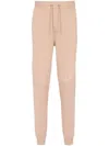 Balmain Embossed Logo Track Pants In Neutrals