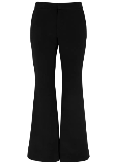 Balmain Flared Crepe Trousers In Black