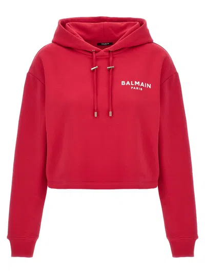 Balmain Flocked Logo Cropped Hoodie In Fucsia