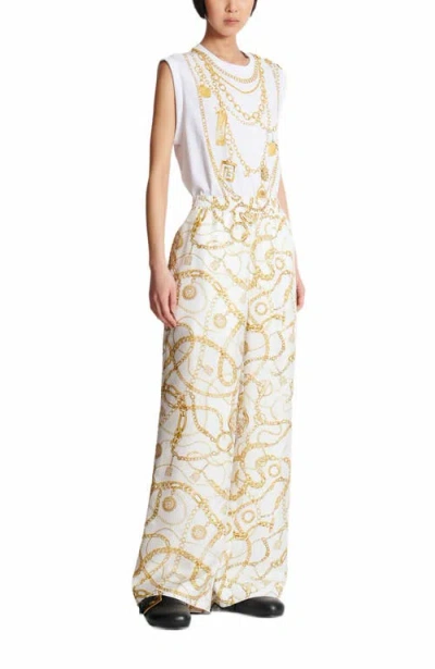 BALMAIN FLOWING PRINTED SILK TROUSERS WITH BALMAIN CHAINS PATTERN