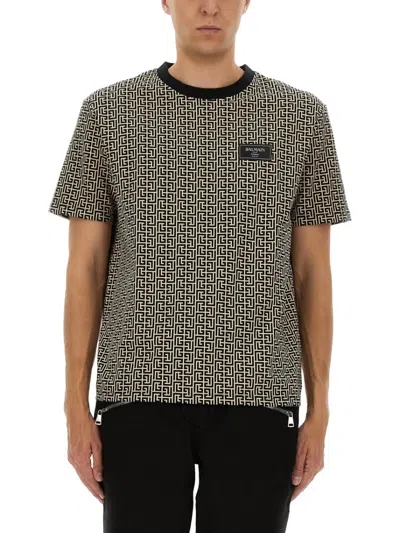 Balmain Geometric Jacquard T-shirt With Subtle Logo Patch In Brown