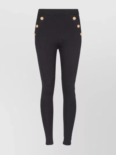 BALMAIN HIGH-WAISTED SKINNY CUT LEGGINGS WITH BUTTON DETAILING
