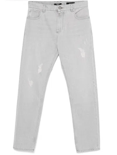 Balmain Washed Denim Straight Cut Jeans In Gray