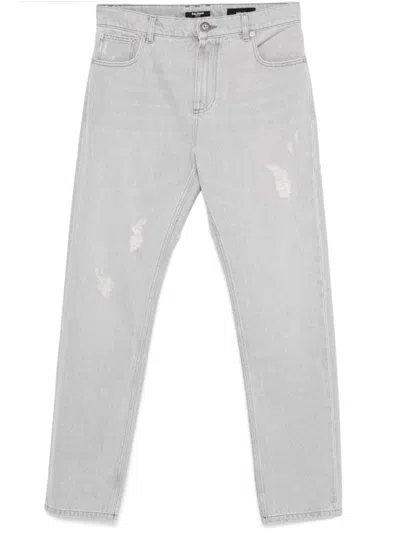 Balmain Washed Denim Straight Cut Jeans In Gray