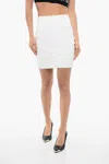 BALMAIN KNITTED BONDAGE MINISKIRT WITH TAPE DETAIL