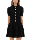 Balmain Textured Ribbed Knitted Cardigan With Button-up Front In Black