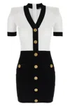 Balmain Fitted Black Dress With Ribbed Texture And Gold Accents In Black