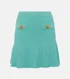 Balmain Buttoned Pointelle Rib Knit Short Cardigan In Grün