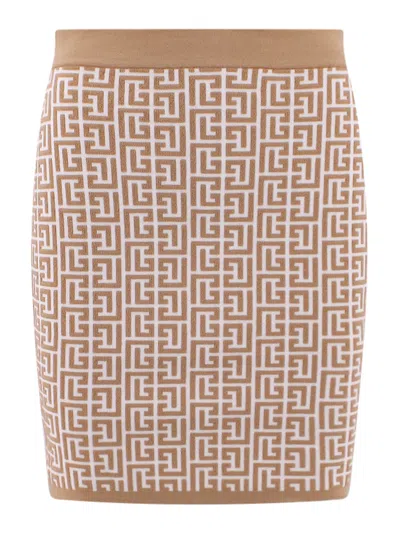 BALMAIN KNITTED SKIRT WITH ALL-OVER MONOGRAM