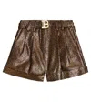 Balmain Lamé Shorts In Gold