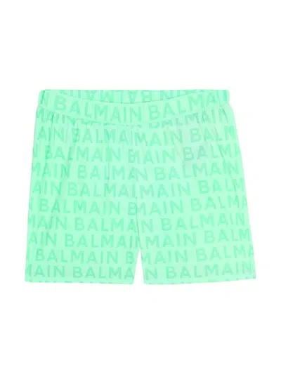 BALMAIN LIGHT GREEN SWIM SHORTS WITH ALL-OVER LOGO