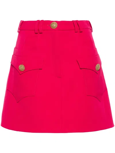 Balmain High-waisted Mini Skirt Logo Buttons In Fuchsia