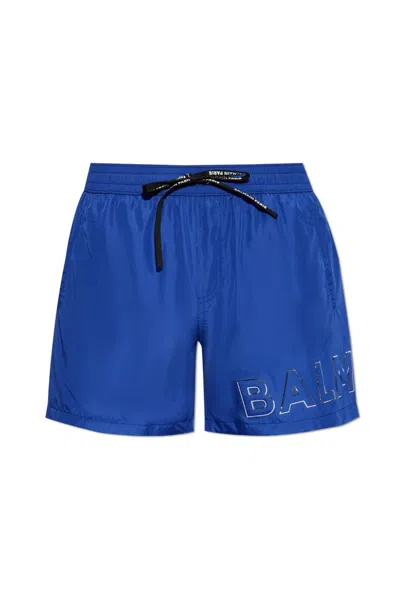 Balmain Logo Embellished Swim Shorts In Blue