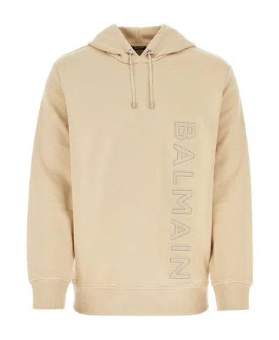 Balmain Logo-embossed Cotton Hoodie In Beige