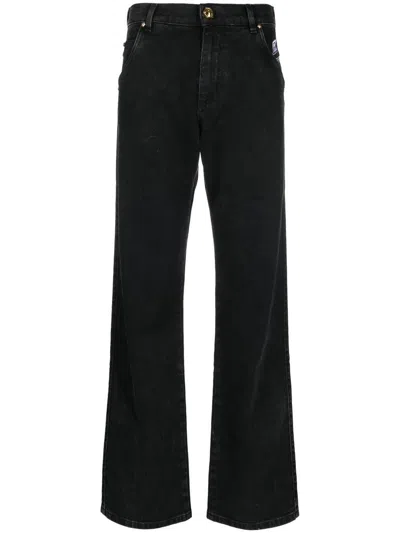 Balmain Embroidered Logo Straight-leg Jeans In Black