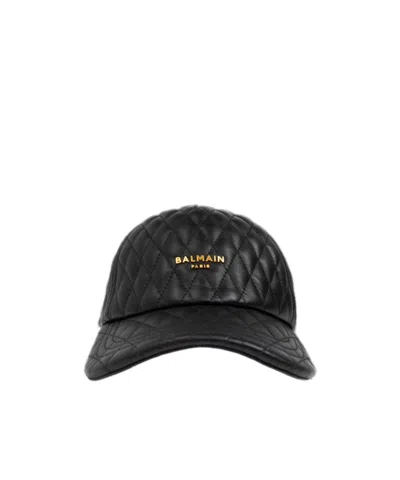 Balmain Logo Plaque Quilted Leather Cap In Black