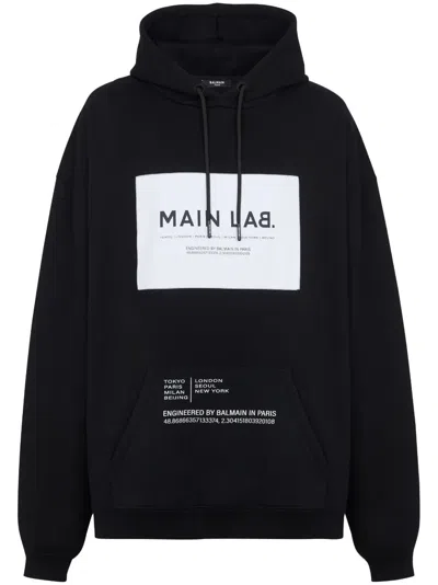 Balmain Oversize Cotton Sweatshirt Drawstring Hood In Black White
