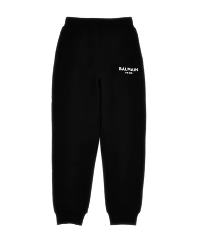 BALMAIN LOGO-PRINT COTTON TRACK PANTS