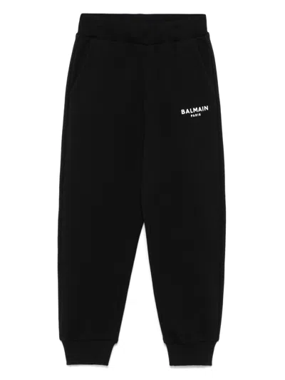 BALMAIN LOGO-PRINT TRACK PANTS