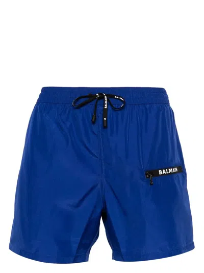 BALMAIN BALMAIN LOGO PRINTED DRAWSTRING SWIMMING SHORTS