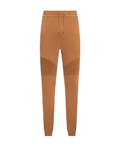 Balmain Logo Printed Drawstring Track Pants In Brown