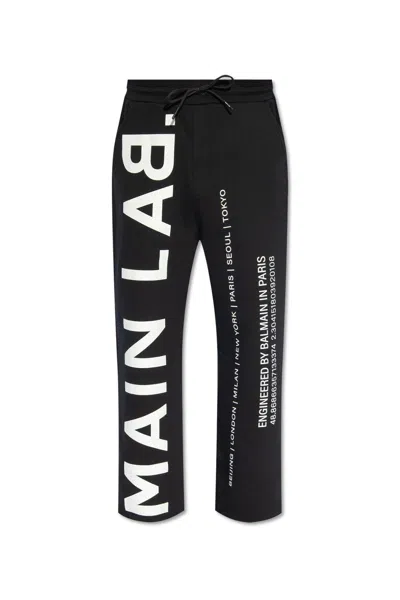 Balmain Logo Printed Track Trousers In Black