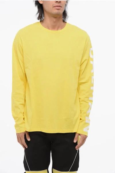 Balmain Long Sleeved Crew-neck T-shirt With Printed Logo In Yellow
