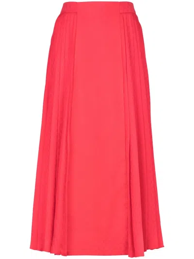 Balmain Mini Monogram Pleated Midi Skirt In Pink