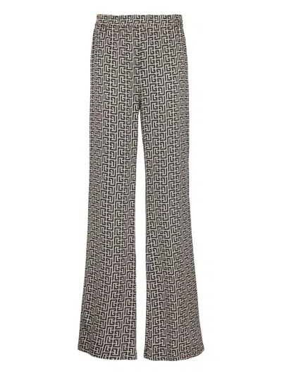 BALMAIN MONOGRAM-PATTERN TROUSERS