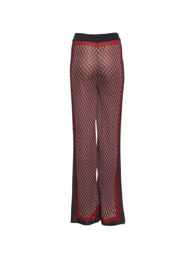 Pre-owned Balmain Monogram Wide-leg Trousers In Red