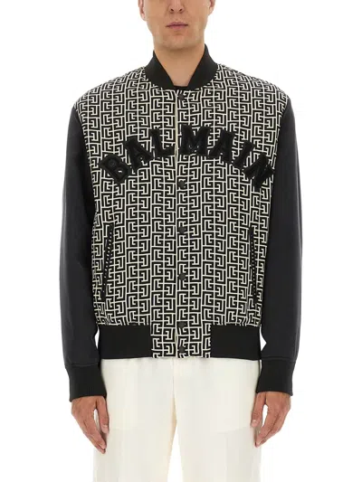 Balmain Monogrammed Varsity Jacket With Patches In Black