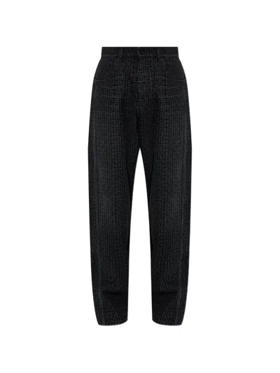 Balmain Monogram-jacquard Denim Jeans In Black