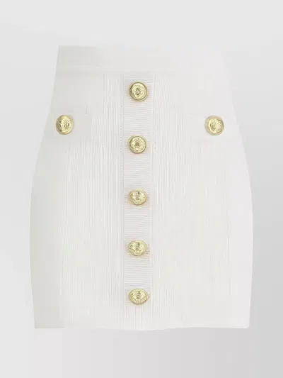 BALMAIN PERFORATED LION BUTTON MINI SKIRT