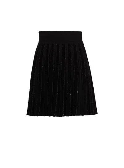 Balmain Pleated Glitter Knit Skirt In Black