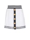 Balmain Pleated Monogrammed Knit Skirt In White