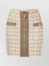 Balmain Button Embellished Front Zip Tweed Mini Skirt In Nude