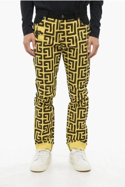 Balmain Pokemon Two-tone Jeans With Cuffed Hem And All-over Monogram In Yellow