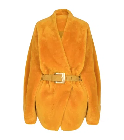 Balmain Shearling Belted Wrap Coat In Yellow