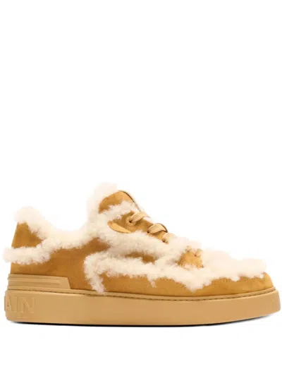 Balmain Shearling Suede Sneakers In Brown
