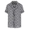 Balmain Monogram Printed Short-sleeved Shirt In Black
