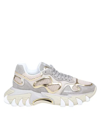 Balmain B-east Sneakers In Gray And Gold Suede And Leather In Grey/gold