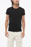 Balmain Solid Color Crew-neck T-shirt With Embossed Logo In Black
