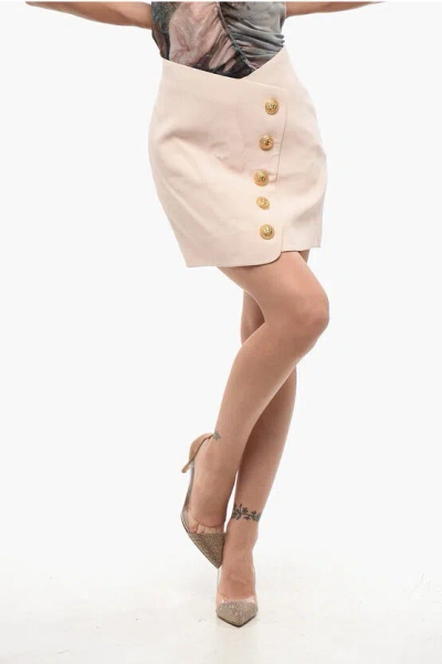 Balmain Solid Color Mini Skirt With Decorative Buttons In Pink