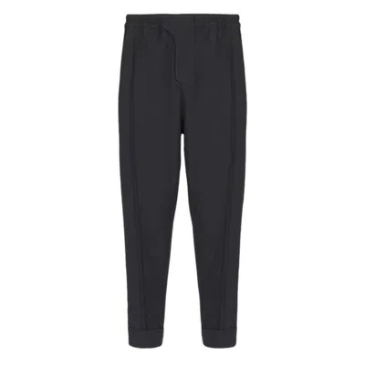 Balmain Tailored Slouch Wool Trousers In Black