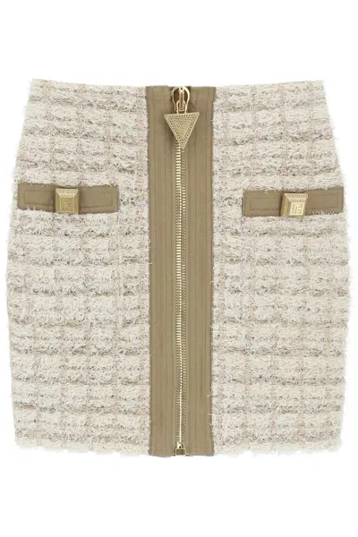Balmain Button Embellished Front Zip Tweed Mini Skirt In Beige