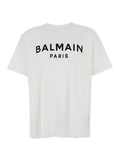 BALMAIN WHITE CREWNECK T-SHIRT WITH LOGO LETTERING ON THE FRONT IN COTTON MAN