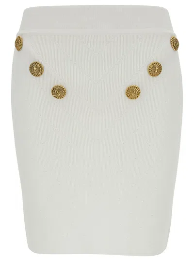 BALMAIN BALMAIN WOMEN WHITE MINI PENCIL SKIRT WITH JEWEL BUTTONS IN VISCOSE BLEND WOMAN