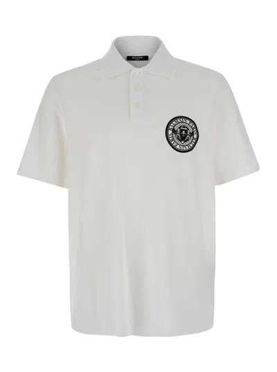 BALMAIN WHITE POLO SHIRT WITH COLLAR AND COIN PRINT ON THE FRONT IN COTTON MAN