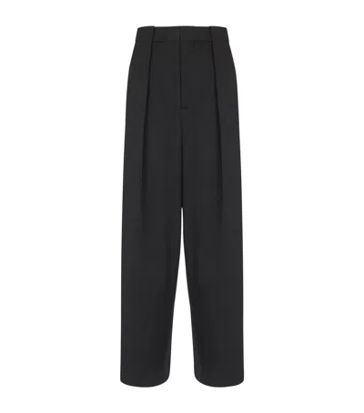 Balmain Wool Pleated Wide-leg Trousers In Black