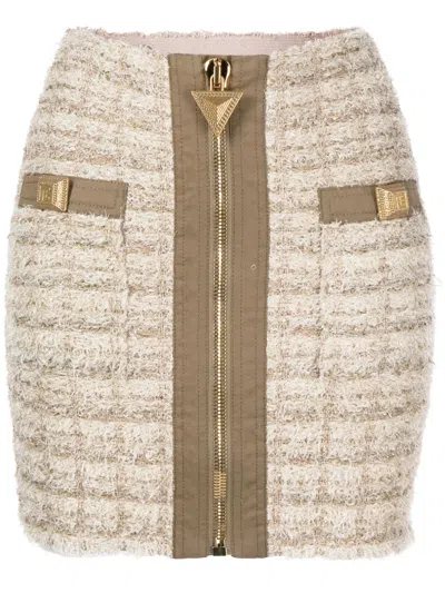 Balmain Button Embellished Front Zip Tweed Mini Skirt In Beige